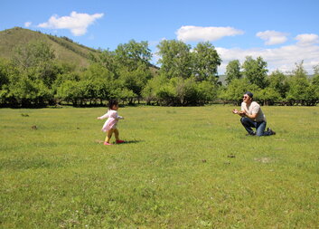 How is Caritas reducing its environmental footprint